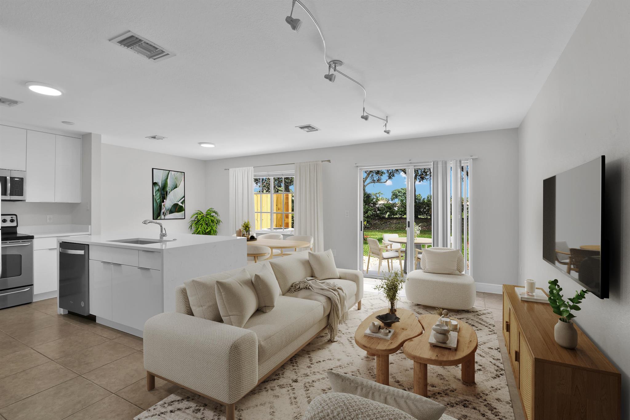 Spacious 3BR/2.5BA Townhome in Sought-After Green Cay Village! Beautifully updated featuring a bright open layout and private backyard. The brand-new kitchen boasts modern cabinetry, quartz countertops, and stainless steel appliances--perfect for entertaining. Upstairs, the primary suite includes a walk-in closet and a sleek contemporary bathroom. Two additional bedrooms and a full bath complete the second floor. Enjoy resort-style community amenities including clubhouse, pool, fitness center, playground, and walking trails. Located in an A-rated school district, with easy access to I-95 and the Turnpike. Minutes from Delray Beach, Atlantic Ave, shopping, dining, golf, and nature parks. HOA includes lawn care, cable, roof maintenance, and insurance. Leasing allowed immediately!