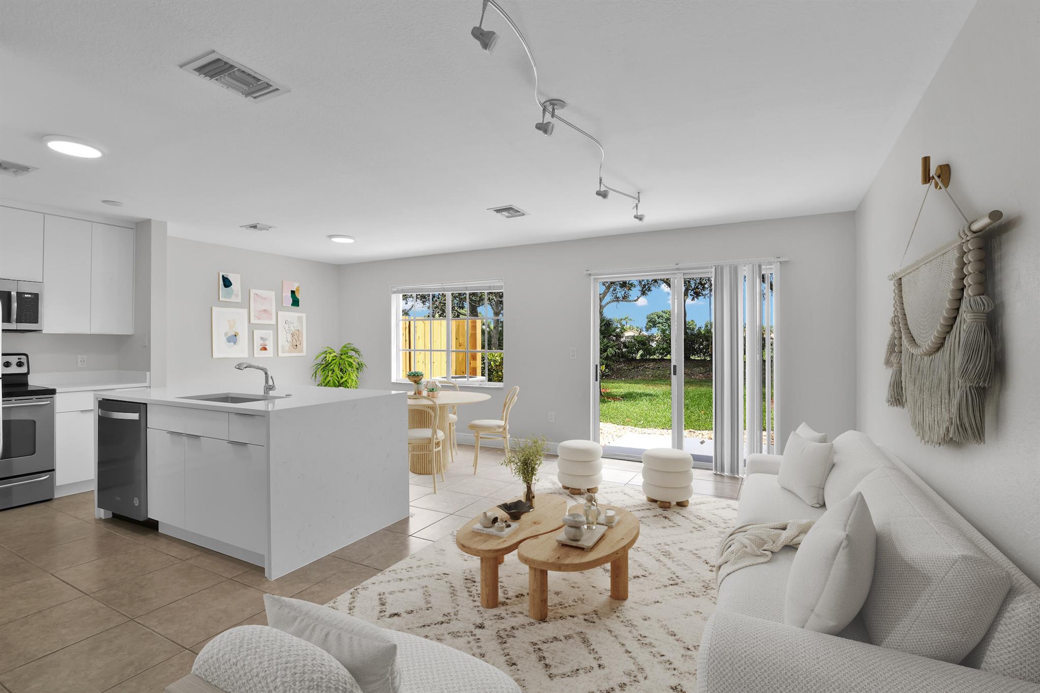 Spacious 3BR/2.5BA Townhome in Sought-After Green Cay Village! Beautifully updated featuring a bright open layout and private backyard. The brand-new kitchen boasts modern cabinetry, quartz countertops, and stainless steel appliances--perfect for entertaining. Upstairs, the primary suite includes a walk-in closet and a sleek contemporary bathroom. Two additional bedrooms and a full bath complete the second floor. Enjoy resort-style community amenities including clubhouse, pool, fitness center, playground, and walking trails. Located in an A-rated school district, with easy access to I-95 and the Turnpike. Minutes from Delray Beach, Atlantic Ave, shopping, dining, golf, and nature parks. HOA includes lawn care, cable, roof maintenance, and insurance. Leasing allowed immediately!