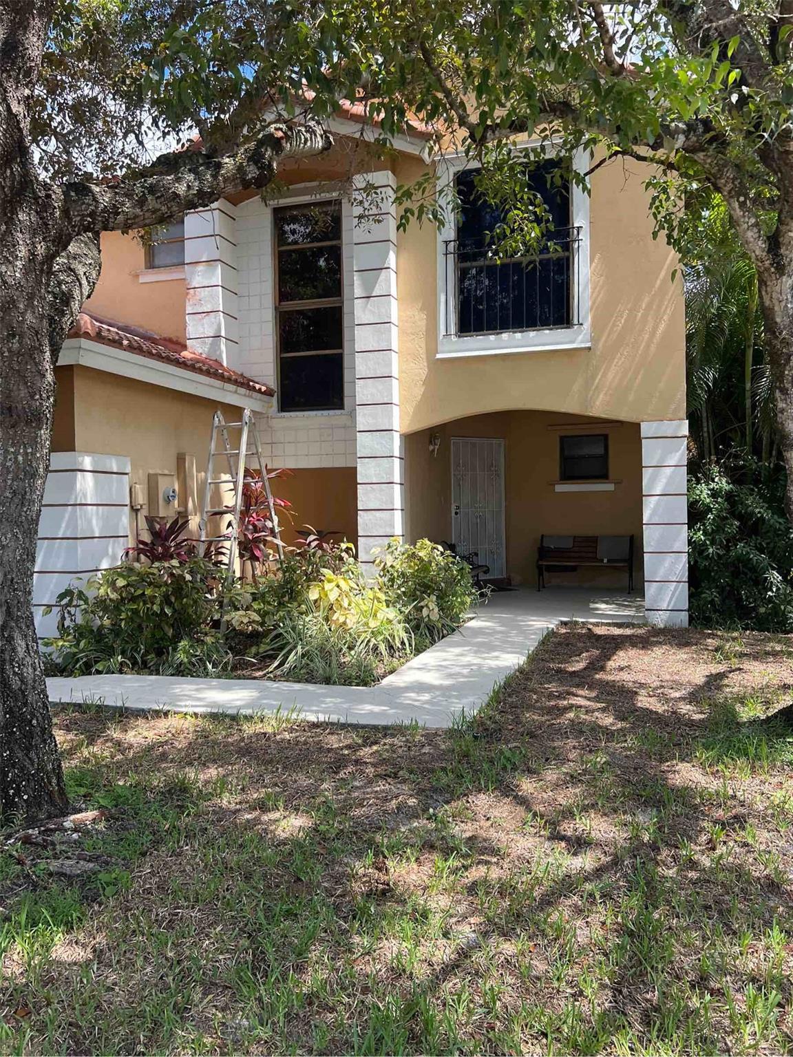 Three Bedroom Two and 1/2 Bath Home in West Davie. Two car Garage with a screened in Patio. Storm shutters, The lot is larger than others in the community and there is access to the back yard from the back gate(s). There is a separate water meter for irrigation and the home is close to the community pool and nearby park. Master Bedroom is on the first floor and features a sitting area and office area. There is no house in front.