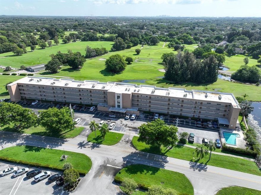 Located in Cooper City, one of the most sought after communities in South Broward, is this small condo complex in the heart of Cooper City. This spacious, bright unit has two large bedrooms and 2 baths with  a beautiful serene view of the golf course and water from the screened patio. There is generous closet space, along with a storage unit in the laundry facility just steps away. Some updating will make this the perfect home for the new owner seeking a comfortable, friendly, neighborhood location. Being sold As-Is.   No age restrictions. All three A-rated schools are very close. City recreation center offering special events is within walking distance, as well as City Hall. Cooper City Golf Club known as Tin Cup is next door.  Painting of exterior of building to be underway shortly.