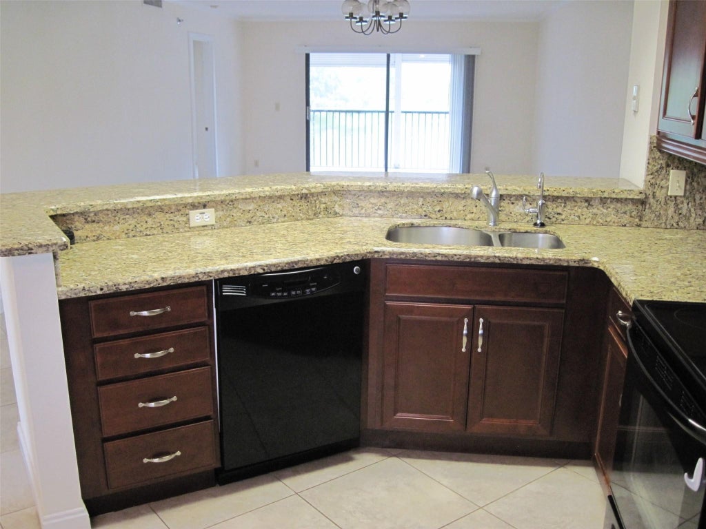 Photo of 2232 N CYPRESS BEND Drive #307, Pompano Beach, FL 33069 (MLS # B26072844)