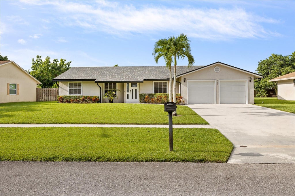Photo of 238 Bilbao Street, Royal Palm Beach, FL 33411 (MLS # B26081848)