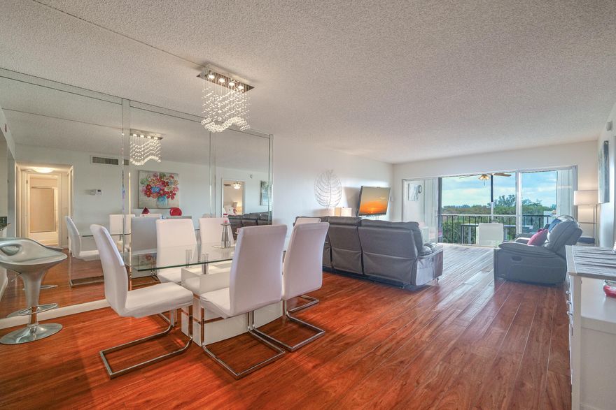 FLASH SALE! SELLER PAYS ONE YEAR OF MAINTENACE FOR OFFERS BY APRIL 30TH!!! ABSOLUTELY GORGEOUS! LIGHT & BRIGHT WITH IMPACT WINDOWS & ACCORDEON SHUTTERS! LAMINATE FLOORS & WASHER DRYER IN UNIT!  40 INSPECTION DONE AND 1 MILLION RESERVES (SIRS) BY DEC 31, 2026. NO SPECIAL ASSESSMENT PENDING!  COMPLETELY REMODELED!! SOLD FURNISHED! ASSOC SAYS 55+, 710 CREDIT, $45K INCOME IN LAST 2 YEARS, 6 MONTHS MAINTENANCE IN ESCROW.  20% DOWN WITH OFFER , IF FINANCING 25% DOWN. INCLUDED IS INTERNET, CABLE HBO, PEST CONTROL, 24/7 GUARDGATE, COMPLETELY FENCED, HEATED POOL, SHUFFLEBOARD, PICKEL BALL, TENNIS & BBQ GAZEBO BY THE POOL!!