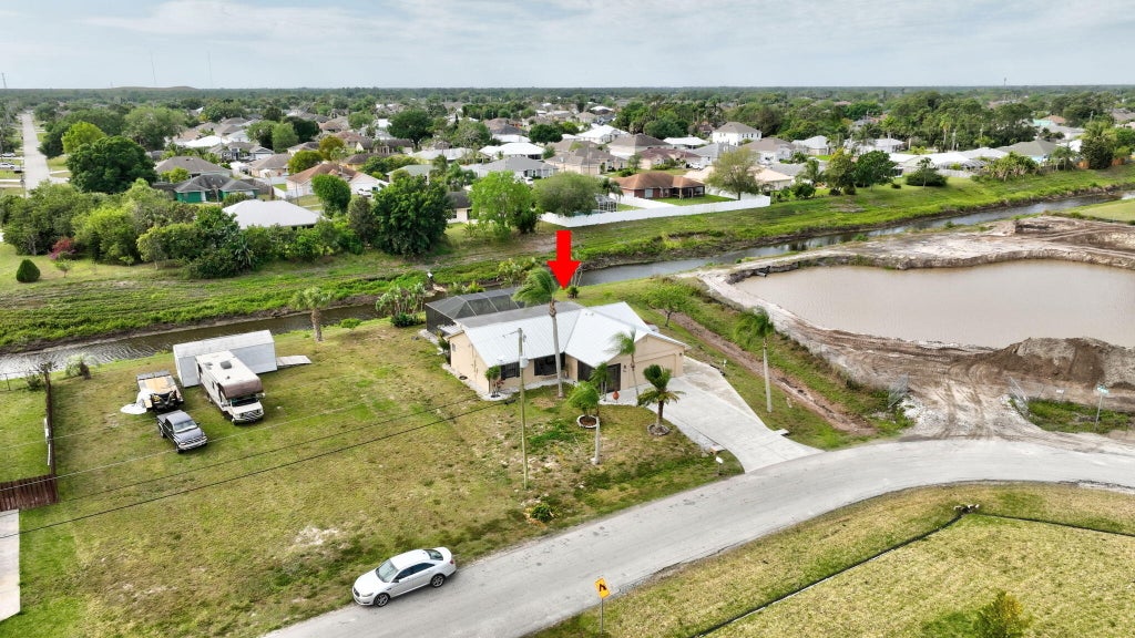 Photo of 880 SW Java Avenue, Port Saint Lucie, FL 34953 (MLS # R11073007)