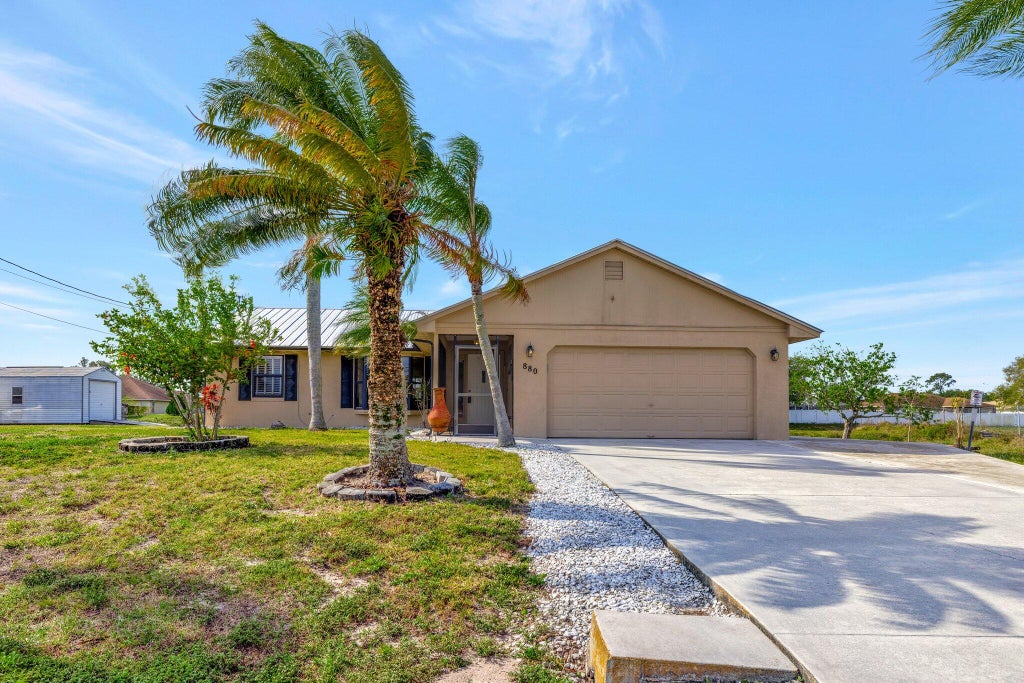 Photo of 880 SW Java Avenue, Port Saint Lucie, FL 34953 (MLS # R11073007)