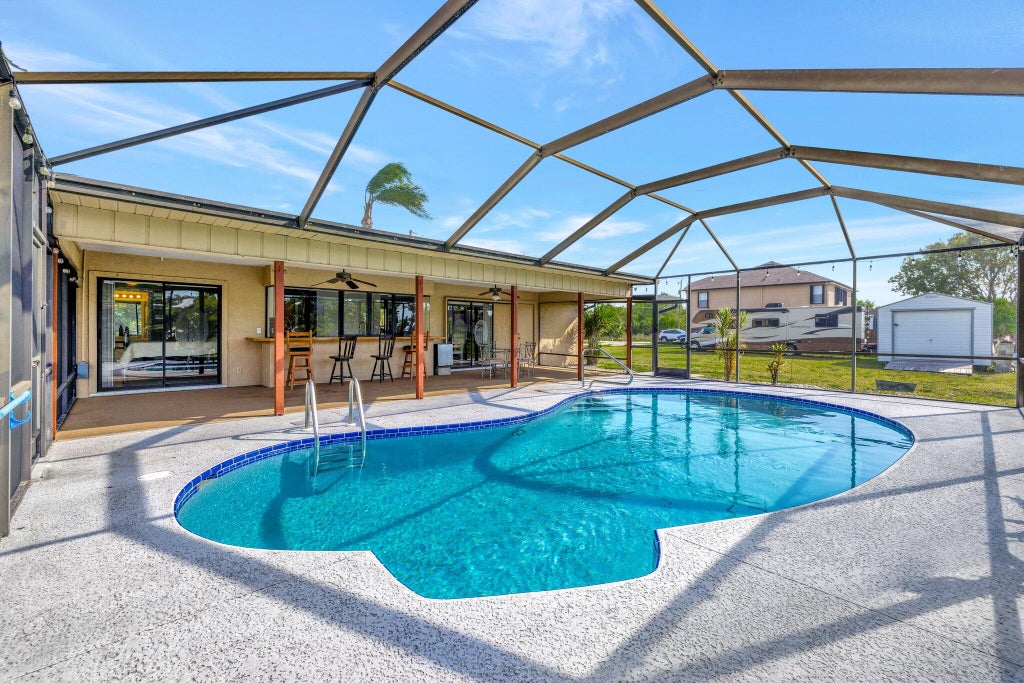 Photo of 880 SW Java Avenue, Port Saint Lucie, FL 34953 (MLS # R11073007)