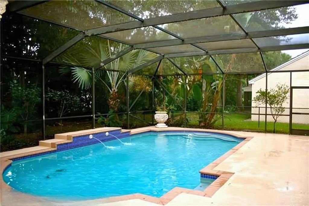 Photo of 3568 N Sanctuary Dr, Coral Springs, FL 33065 (MLS # R11063333)