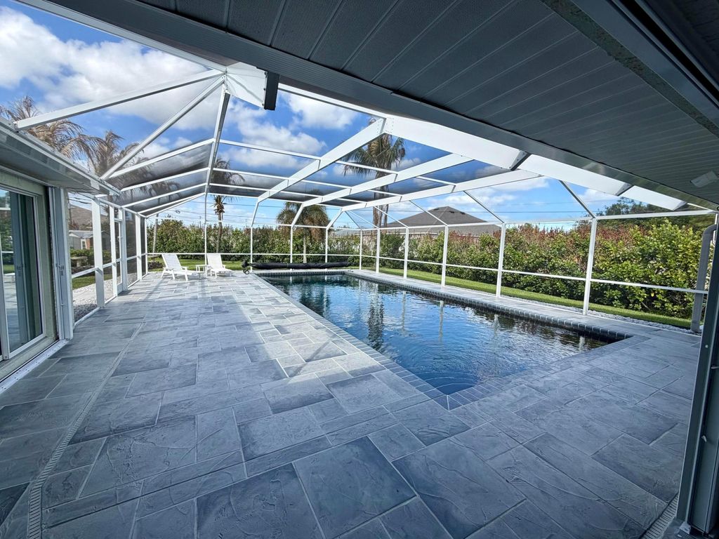 Photo of 1138 SW Kalevala Drive, Port Saint Lucie, FL 34953 (MLS # B26021748)