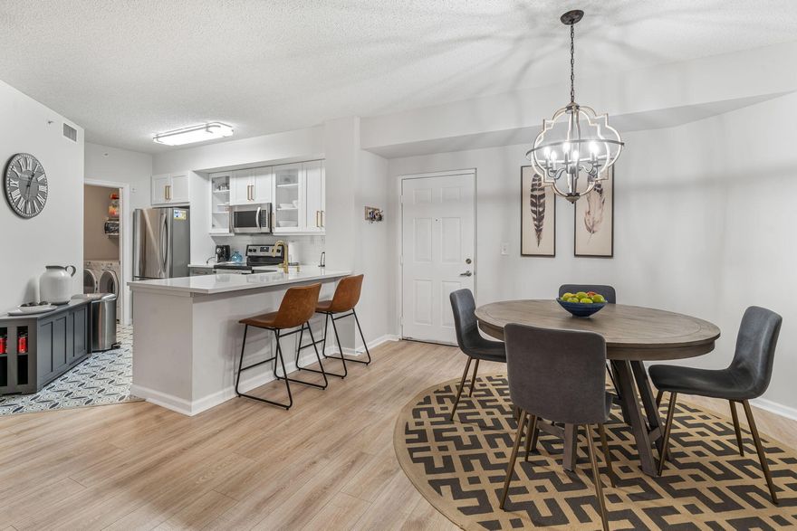 Beautifully renovated 2-bedroom, 2-bathroom residence in the sought-after Saint Andrews at the Polo Club, one of Wellington's premier communities. This exquisite apartment features two spacious en-suite bedrooms, offering privacy and comfort. The remodeled kitchen boasts stainless steel appliances and high-end finishes, seamlessly flowing into the open, sunlit dining and living areas. This home offers access to exceptional community amenities, including a resort-style pool, fitness center, tennis court, and beautifully maintained grounds Situated close to all major equestrian venues, fine dining, and shopping, this property is perfect as a seasonal retreat or full-time residence