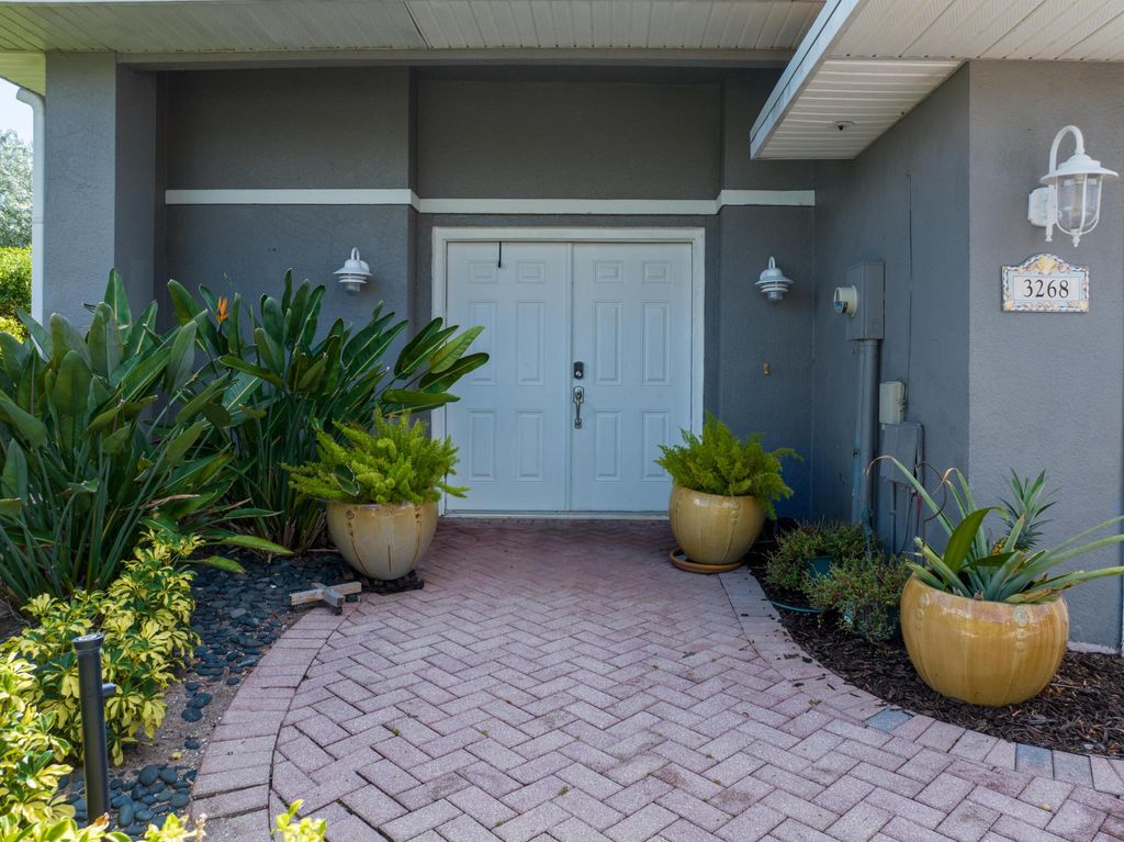 Photo of 3268 Lakeshore Drive, Hutchinson Island, FL 34949 (MLS # B26043106)
