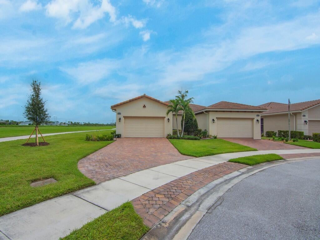 Photo of 24032 SW FIRENZE Way, Port Saint Lucie, FL 34986 (MLS # B26071320)