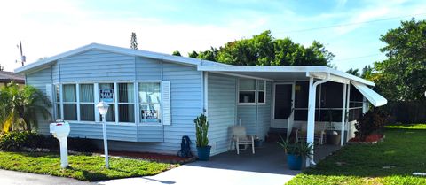 Photo of 3393 Lake Overlook Place, Atlantis, FL 33462 (MLS # R11167979)