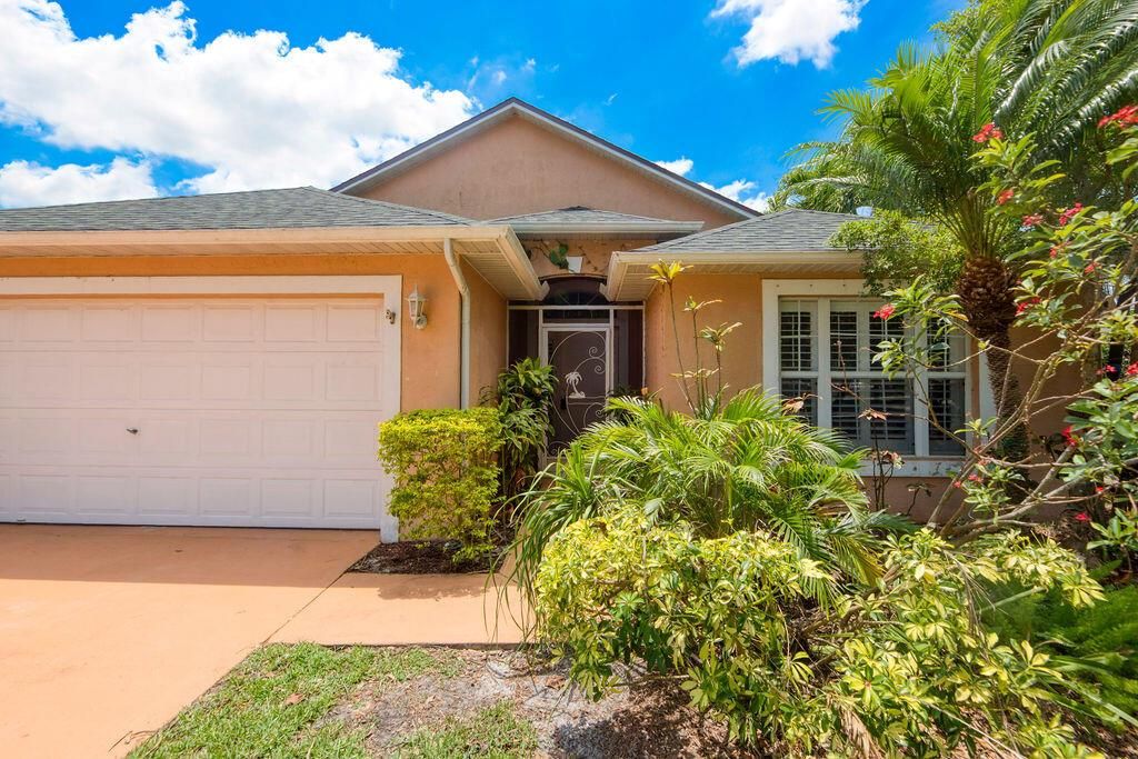 Photo of 520 SW Cyrilla Trail, Port Saint Lucie, FL 34953 (MLS # R11092239)