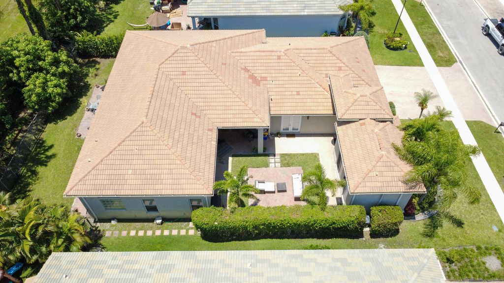 Photo of 10122 Oak Meadow Lane, Lake Worth, FL 33449 (MLS # B26032612)
