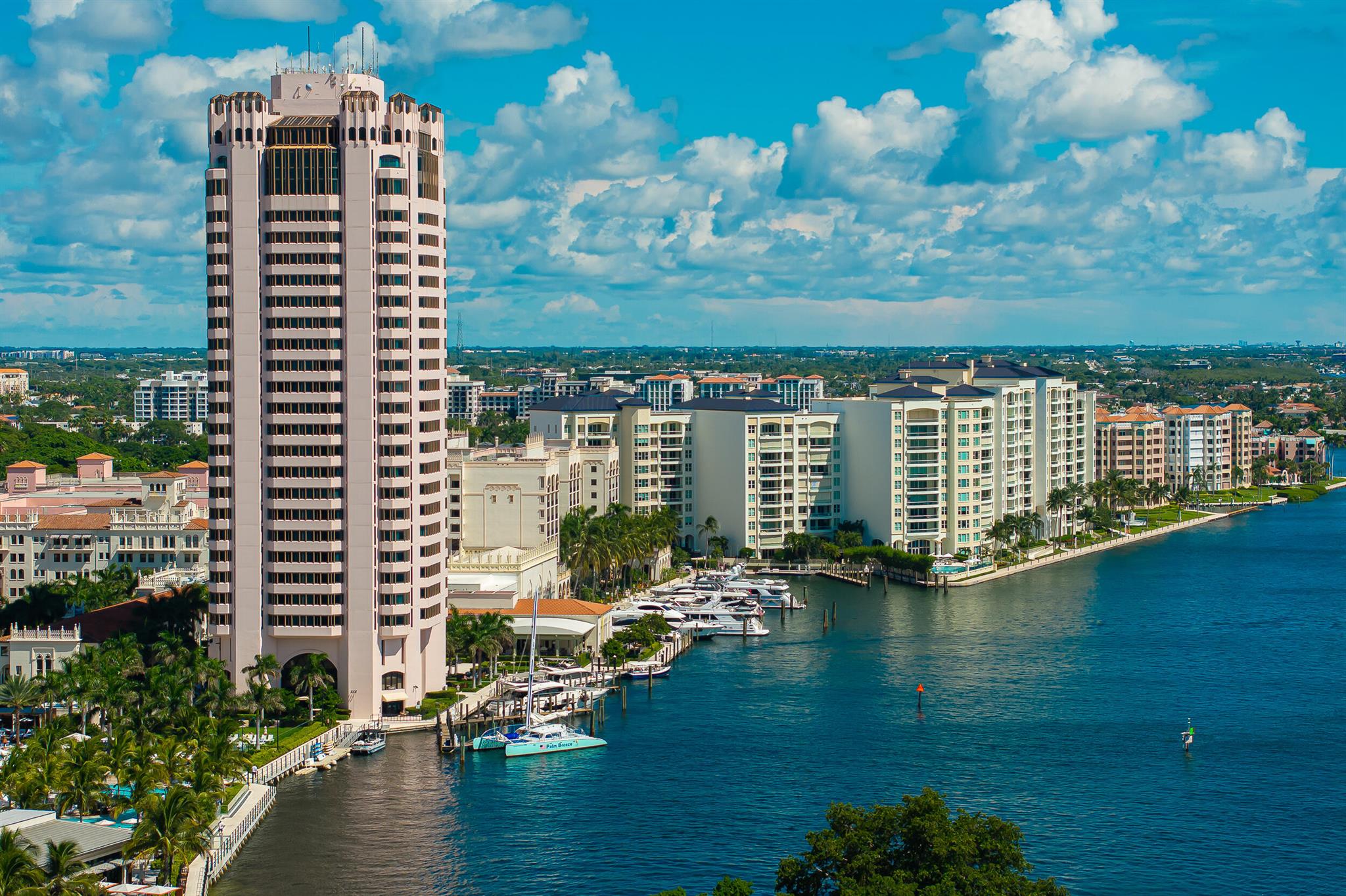 Experience life above Lake Boca at the re-imagined Mizner Grand--Boca Raton's most exclusive waterfront address on the grounds of The Boca Raton Resort. This rarely available 4,213 sq ft flow-through residence offers 3 bedrooms, 3.5 baths, soaring ceilings, private elevator entry, and two expansive terraces capturing both ocean sunrises and city-light sunsets.The east-facing primary suite overlooks Lake Boca & the Atlantic, while two ensuite guest suites open to a west terrace with stunning evening views. Priced with renovation in mind, this is a rare opportunity to design your own modern showplace.Mizner Grand is completing a $40M+ transformation (Q4 2025), introducing all-new amenities: 2 Harborside pools, dual fitness centers, spa with sauna/steam/whirlpool,