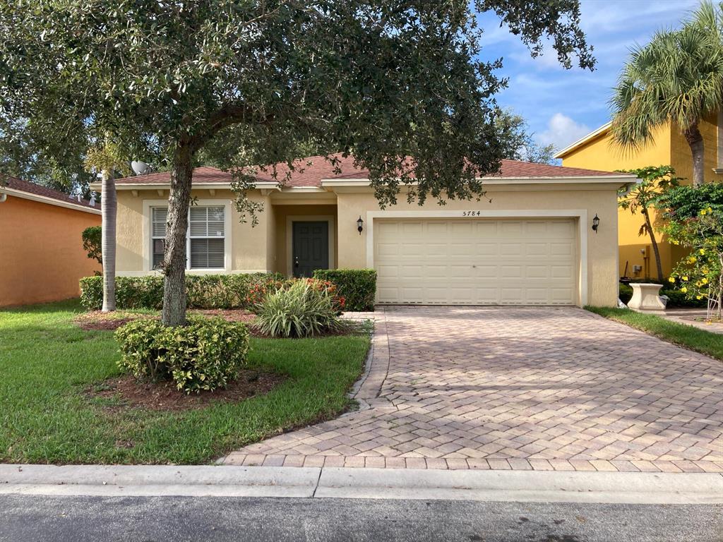 Rarely available 4 bed 2 bath single family residence, located within the Sunterra gated community. Close to highways and shopping centers. Short drive to beaches.