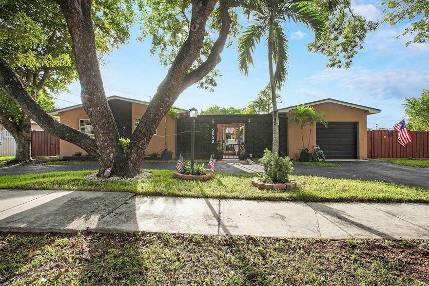 Beautiful corner-lot home on over 10,000 sq. ft. w/lush landscaping & privacy! Features include impact windows, 3 sliders w/shutters, 5-yr old roof, 2 newer A/Cs, & kitchen with gas stove + gas WH - rare in area! Open floor plan w/new luxury vinyl floors, remodeled primary suite, & freshly painted interior. Screened pool w/waterfall, circular driveway, garage, gated side parking for RV/boat, & oversized shed. Near Turnpike, 826, University of Miami, A-rated schools, top hospital, parks, Horse Country, malls, restaurants & airport. close by A true South Florida gem! Move-in ready! See and buy today!