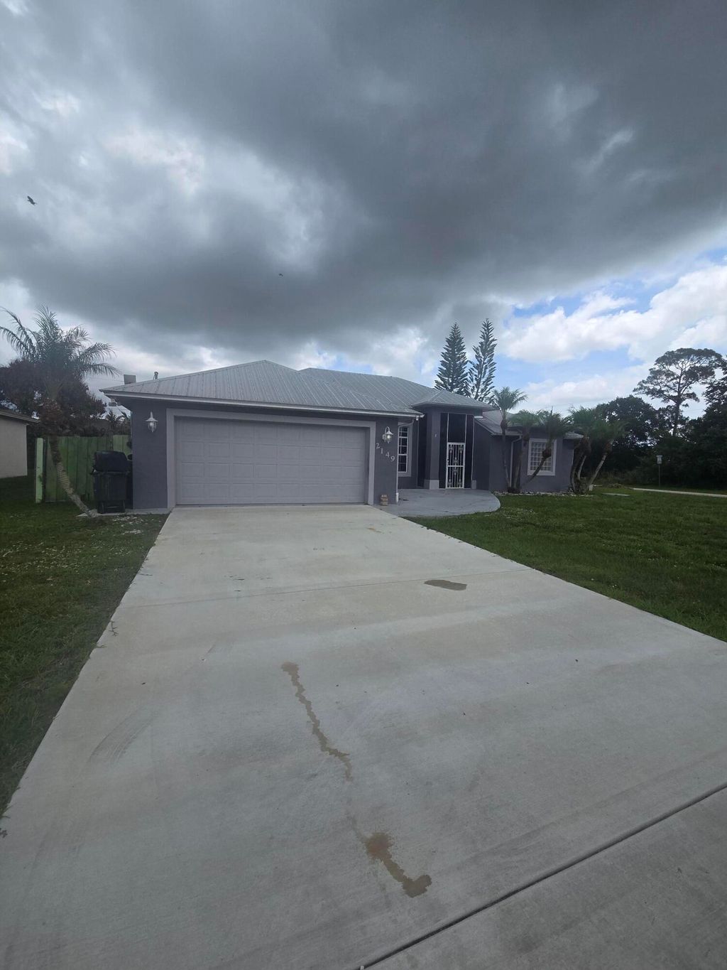 Photo of 2149 SW Savage Boulevard, Port Saint Lucie, FL 34953 (MLS # B26035393)