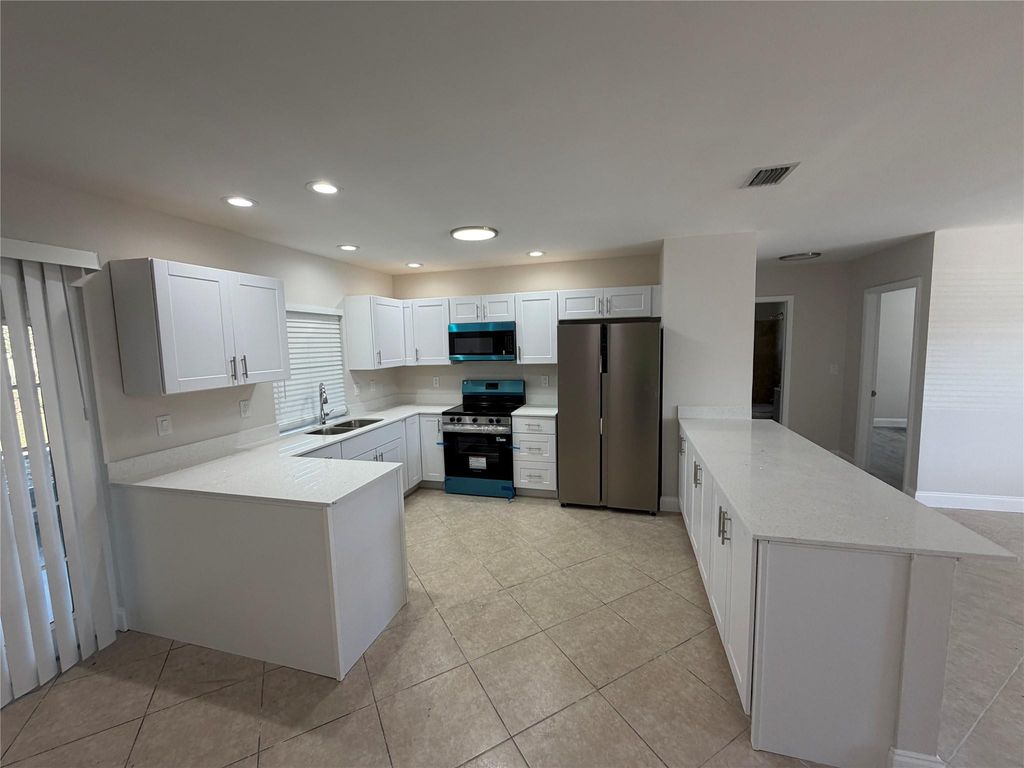 Photo of 703 SW 4th Avenue, Boynton Beach, FL 33426 (MLS # F10555922)