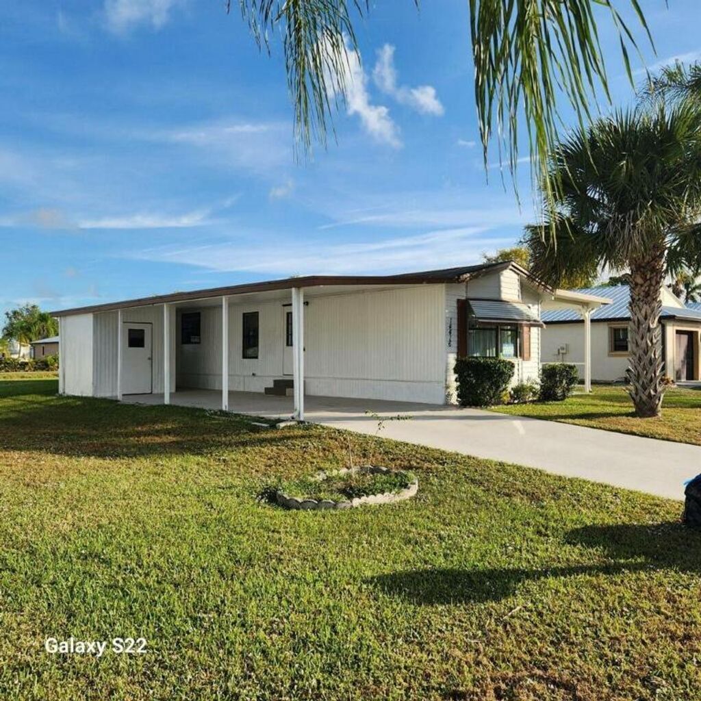 Photo of 14416 Dalia Avenue, Fort Pierce, FL 34951 (MLS # R10928729)
