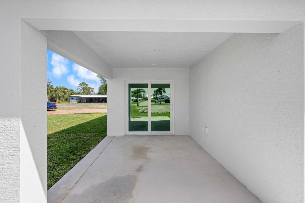 Photo of 11 Villa Del Norte, Fort Pierce, FL 34951 (MLS # R11138636)