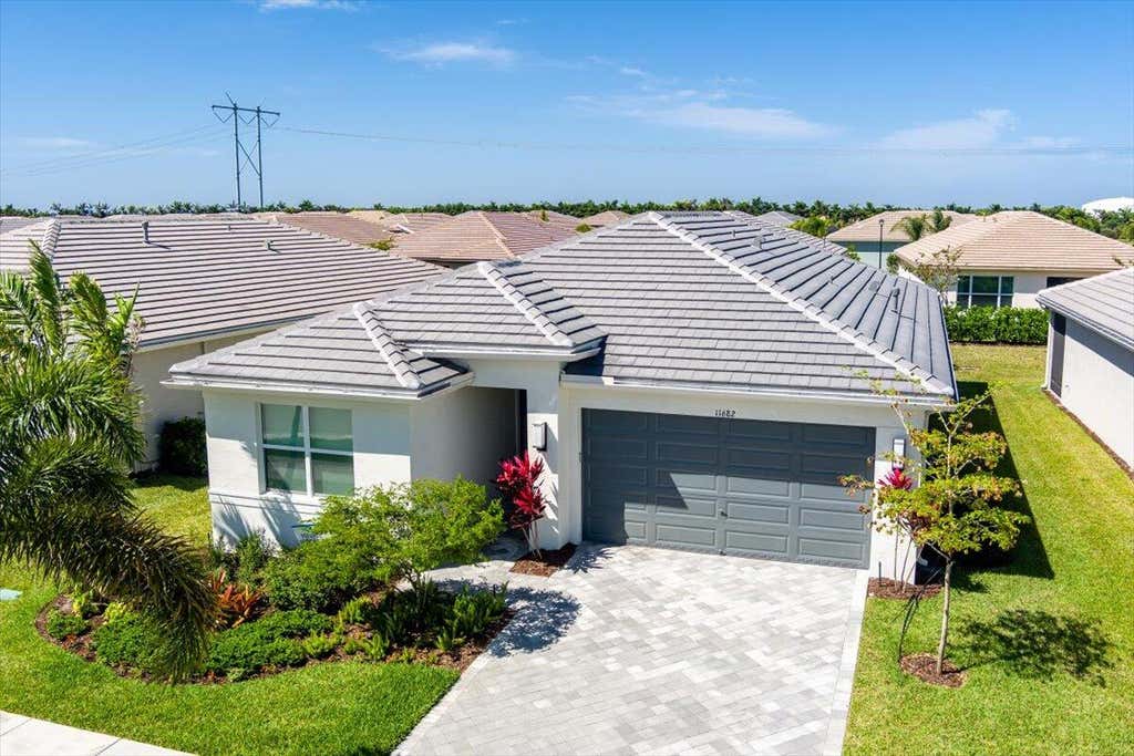 Photo of 11682 SW Oceanus Boulevard, Port Saint Lucie, FL 34987 (MLS # R10970657)