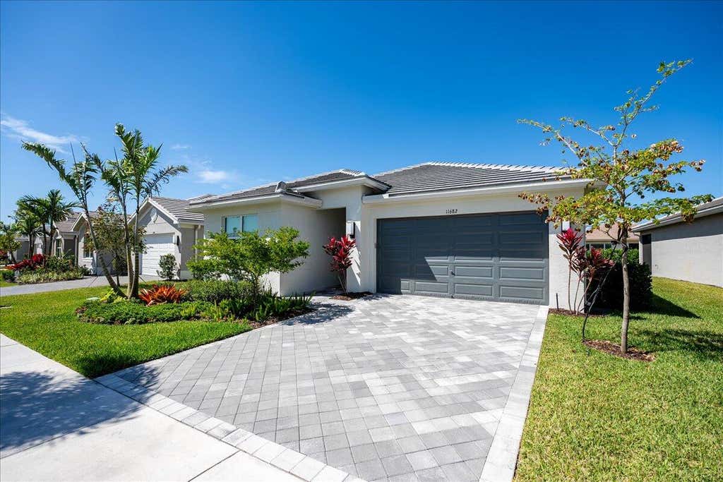 Photo of 11682 SW Oceanus Boulevard, Port Saint Lucie, FL 34987 (MLS # R10970657)