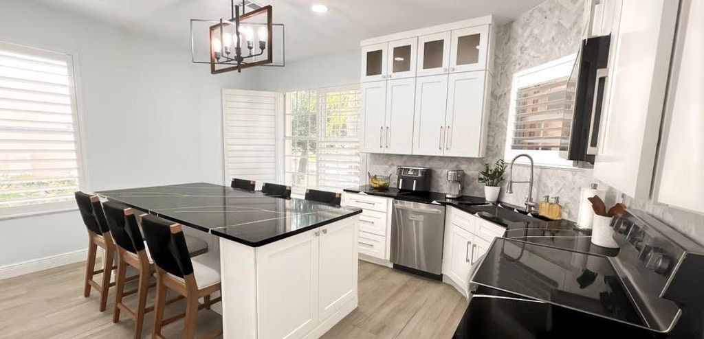 Photo of 8070 Murano Circle, Palm Beach Gardens, FL 33418 (MLS # B26029878)