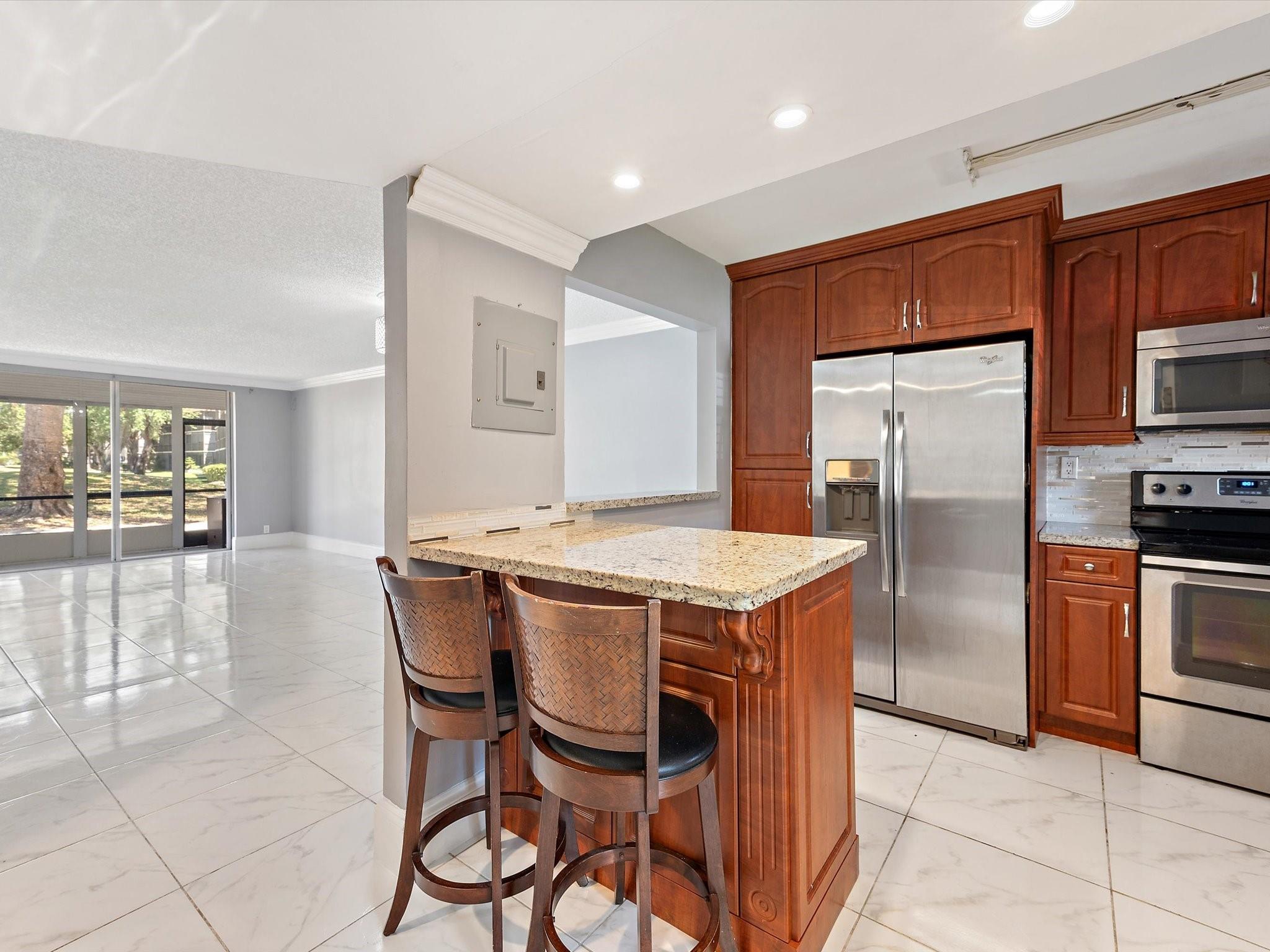Beautifully remodeled Condo with WASHER & DRYER inside unit & INTERNET, CABLE & WATER included! Hollybrook is a guard GATED community. Kitchen has granite counter tops, stainless appliances and find tile thru out unit. Enjoy luxury as though living in a resort year around. Find PGA & PAR 3 golf courses where residents golf for FREE (just pay for cart). Tenants appreciate access to all Hollybrook offers such as 7 HEATED swimming pools with BBQ areas, tennis, pickleball, fitness center, club house with shows, dances, Bingo, EV charing stations, billiards, meetings and cards and game rooms, Ping Pong, library and Much More! There is even a Restaurant on site. Oh! Bring your pet less than 20 lbs. 1 person must be 55. Check income and credit requirements.