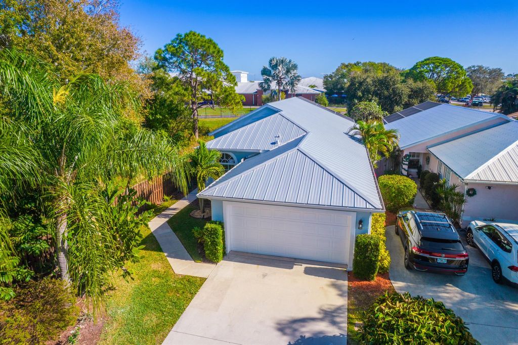 Photo of 3573 SW Coco Palm Drive, Palm City, FL 34990 (MLS # R10937036)