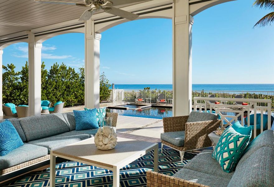 La Plage....Home Is Not A Place...It's A Feeling.  Imagine beginning each day with the sun rising over the horizon on one of the most spectacular stretches of beach in South Florida, located at 1847 S Ocean Blvd, Delray Beach. This stunning British West Indies home tucked behind private gates is custom designed with an exquisite modern touch, sited high above the dune in sublime privacy offering expansive ocean views from virtually every room. A flexible floor plan revealing 9,170 TSF, 4 bedrooms, and 6.1 Baths constitutes the finest in architectural accoutrements. This 3-level home consists of an open layout, custom finishes with the finest materials, European Oak floors and Nano doors that open to the ocean allowing sun-drenched interiors. Featuring a chef's inspired kitchen including top-of-the-line Wolf appliances, Cesar stone countertops, adjacent informal dining area, spacious ocean facing living/family room complete with stylish jaw dropping bar, formal dining room and first-floor media room. Downstairs you will find an expansive Game Room equipped with a full bathroom, bar and storage. Take the private elevator upstairs leading you to the grand master-suite with a private office and spacious sitting room that opens to a large covered private balcony with an outdoor shower. The jaw-dropping ocean facing master-bathroom features a spa-like shower, steam room with skylight and free-standing tub. Other features include custom cabinetry & built-ins, custom stonework throughout, new roof, and an oversized loggia with a summer kitchen, pool/spa and direct ocean access, specifically designed for oceanfront entertaining. This oceanfront dream is the perfect spot for year-round enjoyment and only moments from the famed Atlantic Avenue. This is the quintessential luxury beachfront residence to fall in love with and never leave.