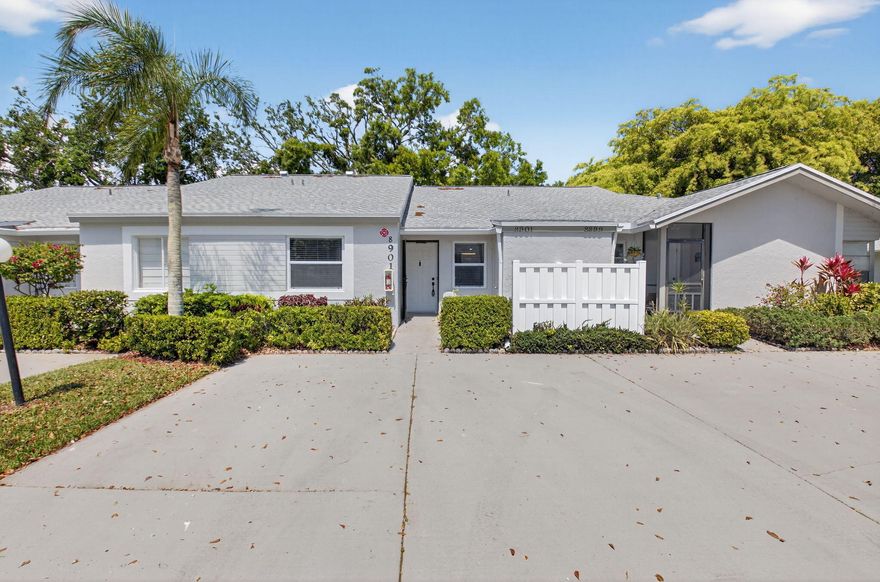 This beautifully remodeled and move-in ready 2-bedroom, 2-bathroom villa offers comfort, style, and modern upgrades, complete with a serene lake view.  The spacious primary suite features a private en-suite bathroom, walk-in closet and has views of the lake.   The home has been thoughtfully updated with new tile flooring throughout, impact windows, along with a fully remodeled kitchen and bathrooms featuring designer finishes and contemporary style.  The kitchen is equipped with newer appliances, ample cabinetry, and plenty of storage space. Located in Whipser Walk, a desirable active 55+ gated community, residents enjoy top tier amenities including tennis and pickleball courts, a heated pool, hot tub, fitness center, sauna, and clubhouse.  The HOA covers water, internet, cable.