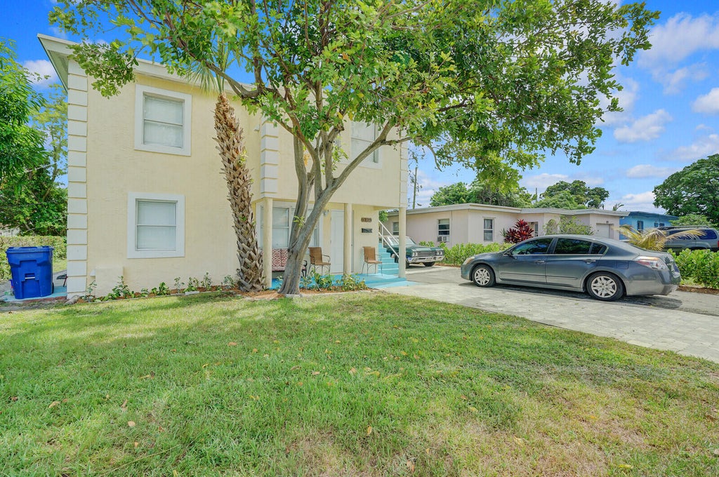 Photo of 1225 W 10th Street, Riviera Beach, FL 33404 (MLS # B26072141)
