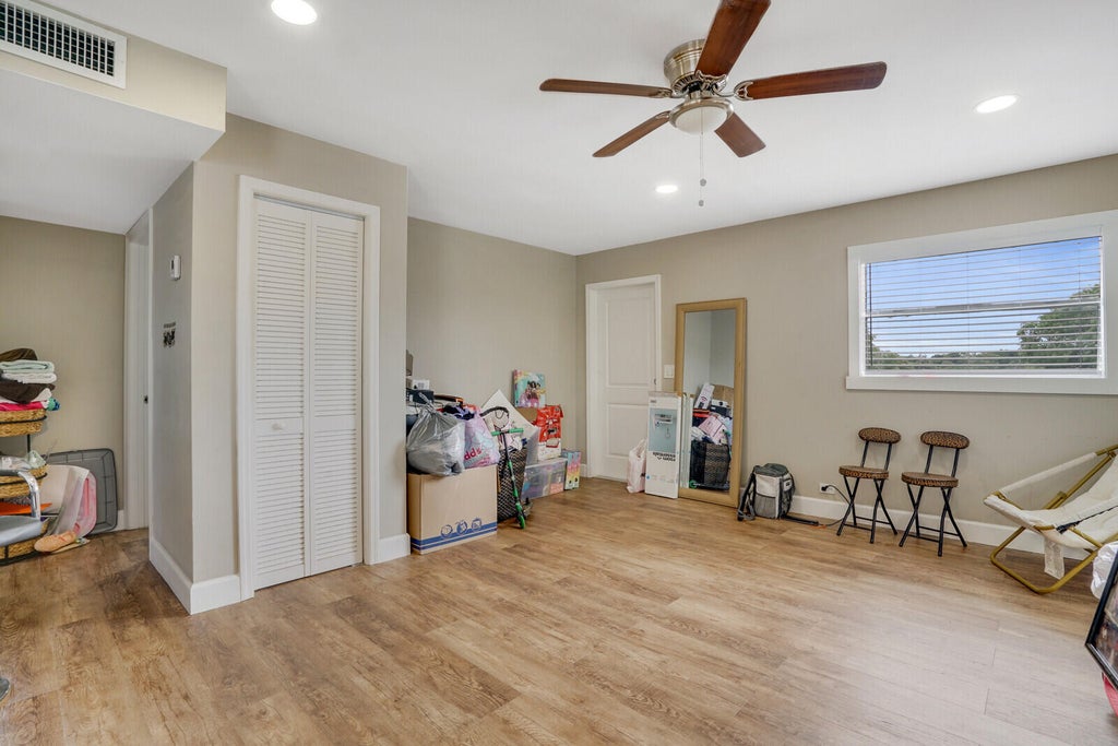 Photo of 1225 W 10th Street, Riviera Beach, FL 33404 (MLS # B26072141)