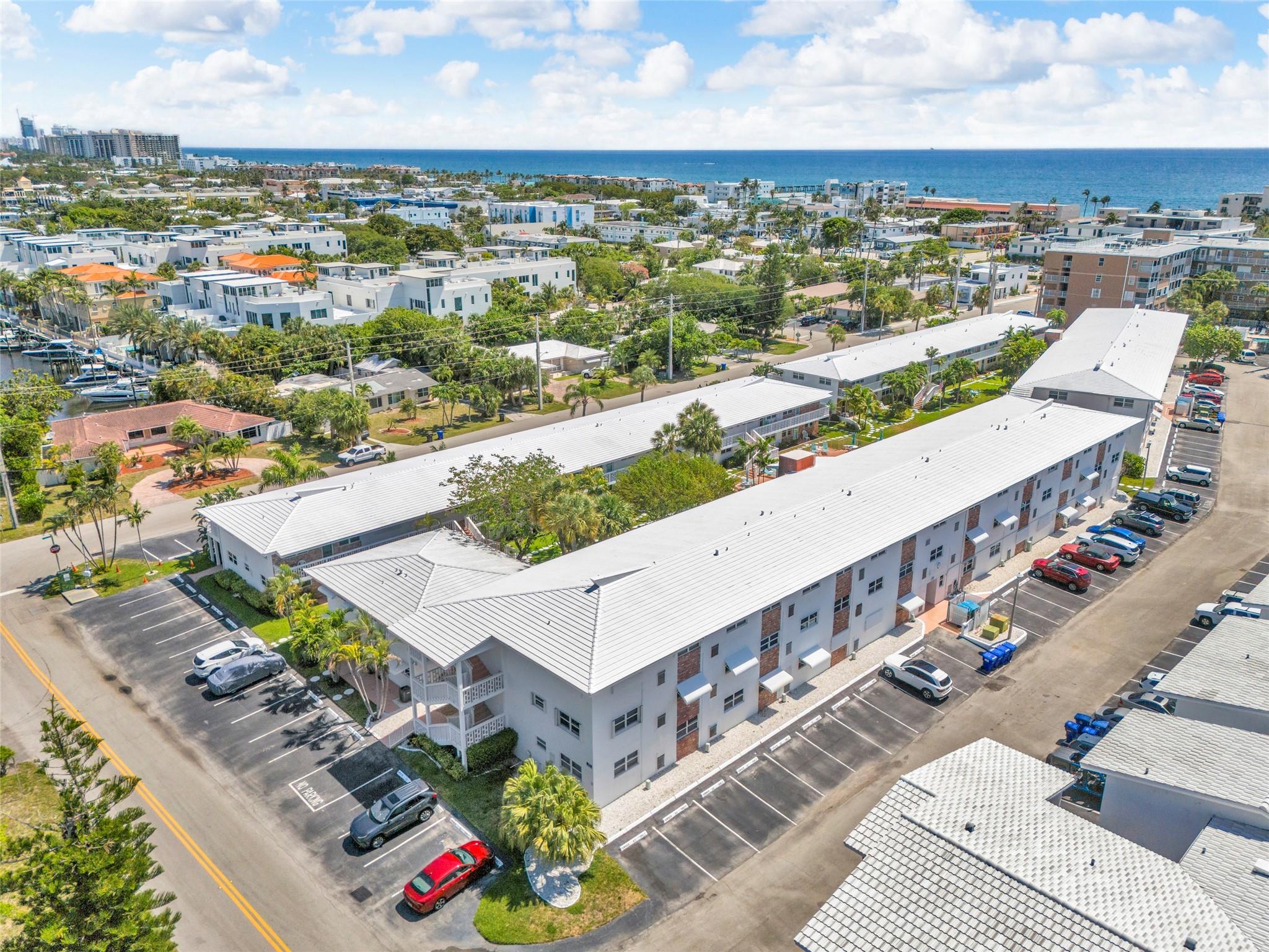 Lauderdale by the Sea- Stunning 2BR/1BA First Floor Condo in a Quiet 55+ Seaside community. Tastefully updated unit boasts Venetian Plaster Walls & Contemporary Epoxy floors throughout, Open & Bright Kitchen w/ Clean White Wood Cabinetry, Beautiful Quartz Counters, & newer appliances. Thoughtfully designed bathroom including a Curbless Shower complete w/ Multi-head Body Spray Shower System, Modern Cabinetry w/ clean Quartz counter. Spacious Bedrooms, Impact Windows, & Water Heater replaced in 2024 complete the package. Enjoy the Tranquil Lounging Area with oversized Pool for Sunning and Relaxing, shuffle board courts and BBQ area. Desirable location with easy walkability to the Beach, Restaurants, Bars, Shopping, Entertainment, Festivals and all that Lauderdale By The Sea has to offer!