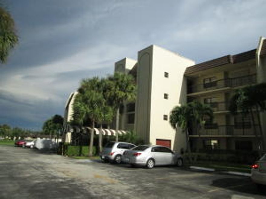 First floor full 2/2 all tile floors, scn patio with roll down shutters.  Newer W/D, ref & dishwasher.  Move-in condition.  Walk to clubhouse and satellite Pool.  One pet 30 lb limit OK.Active 55+ 24/7 guard gated community.  Full time social director schedules shows, trips, movies etc.  Courtesy Bus 2 days a week to grocery, malls, library etc.  Come Discover Golden Lakes.