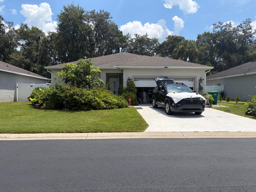 Photo of 5250 Oakland Lake Circle, Fort Pierce, FL 34951 (MLS # B26075758)