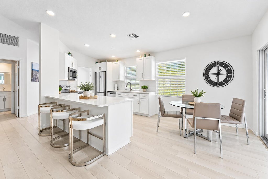 Photo of 8282 Old Forest Road, Palm Beach Gardens, FL 33410 (MLS # B26086906)