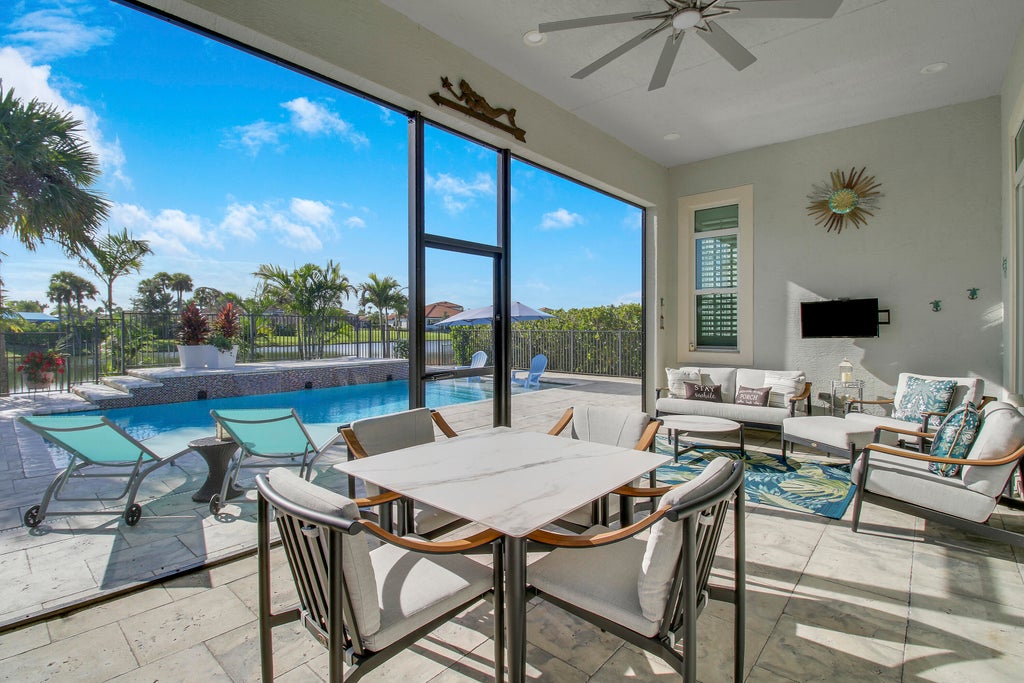 Photo of 8653 SW Carrara Way, Port Saint Lucie, FL 34987 (MLS # B26092318)