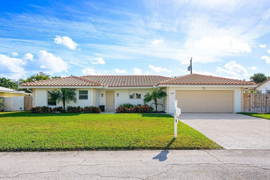 Photo of 1205 Dolphin Road, Singer Island, FL 33404 (MLS # R10938658)