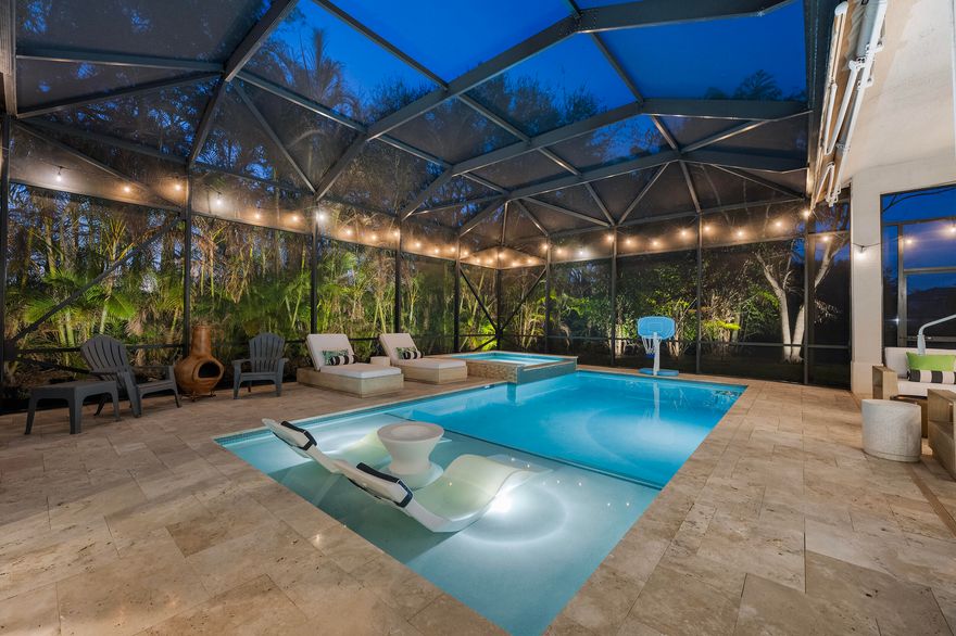 Exquisite Arthur Rutenberg CBS Home nestled at the end of a private cul-de-sac, 4 bedrooms + den, 3 baths & a 3-car garage. 2025 roof & two AC units installed 2021. Soaring 12' ceilings, rounded archways, rich crown molding, plantation shutters & marble floors create timeless elegance. Solid 8' wood doors with sleek black hardware add a modern touch. The chef's kitchen shines with granite, 48'' cabinetry, pullout drawers, glass stovetop,  double ovens, walk in pantry, butler's pantry--perfect for entertaining. Enjoy a heated/chilled saltwater pool with hot tub, retractable awnings for shade. No need to worry about storms with storm protection and impact glass front door. Clubhouse with pool, fitness center, pickleball & tennis. Optional golf membership available at Hammock Creek  Golf Club