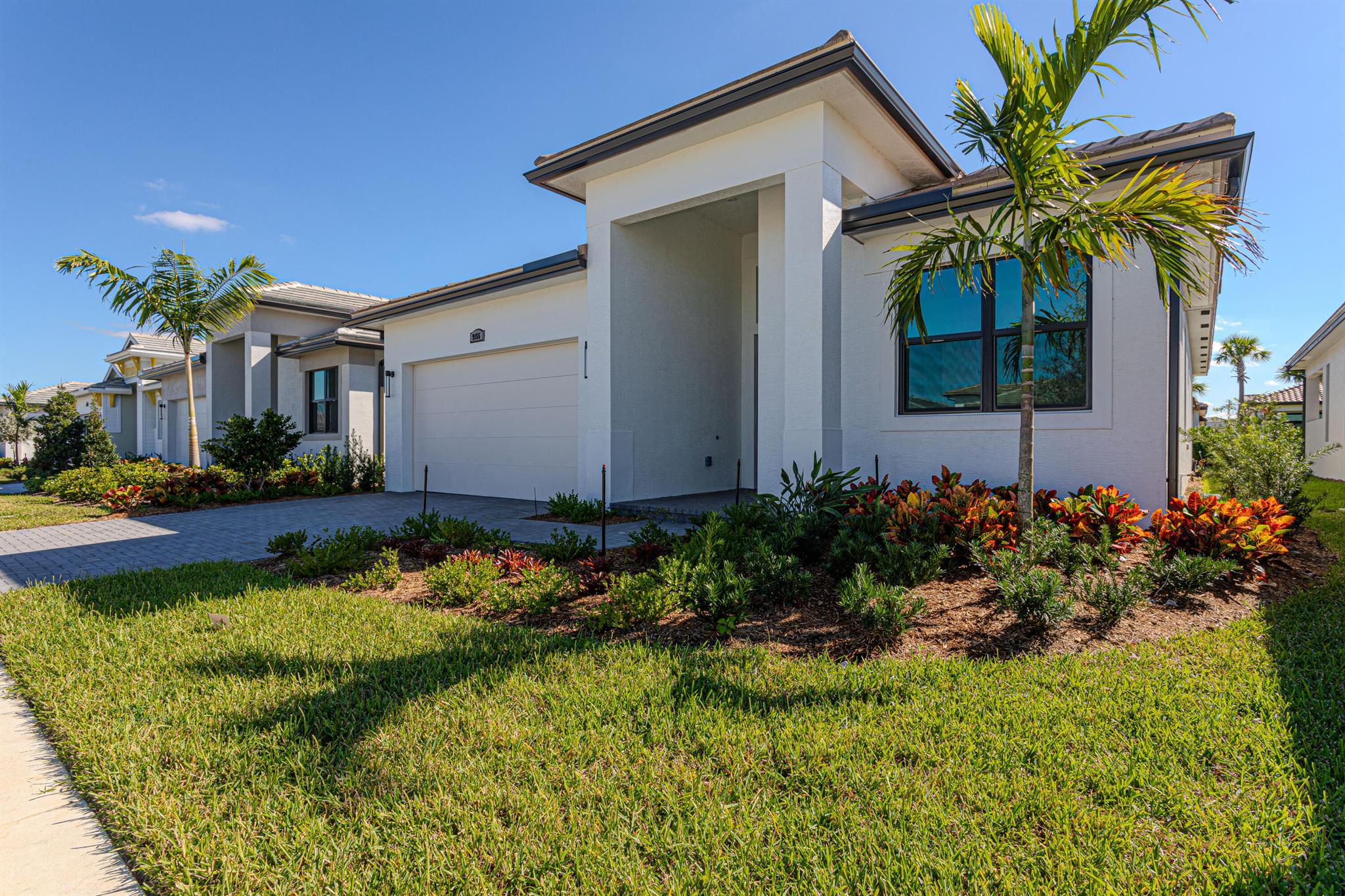 AUGUST MOVE IN SPECIAL !!! First Month & Security will make this your new home. Experience luxury living at its finest in this stunning, 4 bedroom, 3 bath home featuring soaring ceilings, an open-concept design, and abundant natural light. Enjoy easy living with a modern kitchen, and expansive hurricane-impact glass windows, sliders, and doors. Step outside to your private patio perfect for relaxing or entertaining. Rent includes cable, internet, pest control, and lawn maintenance.Located in the sought-after PGA Verano all-inclusive amenities.