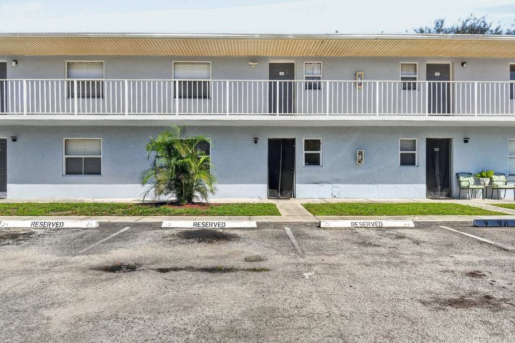 Photo of 617 IXORIA Avenue #23, Fort Pierce, FL 34982 (MLS # B26077123)