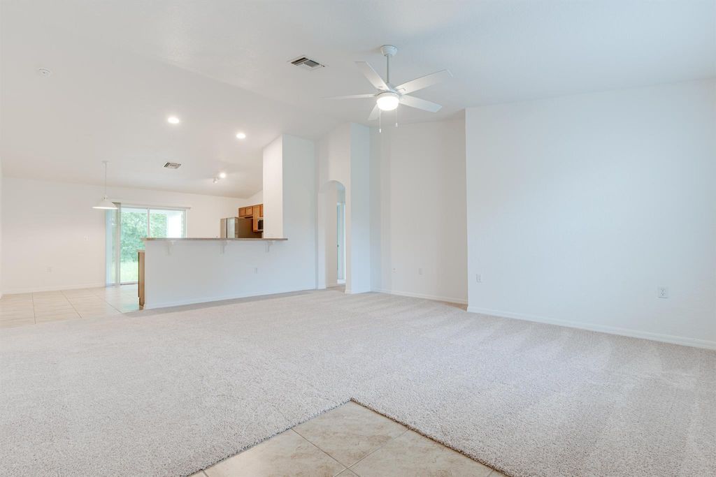 Photo of 443 SW Kabot Avenue, Port Saint Lucie, FL 34953 (MLS # R11009297)