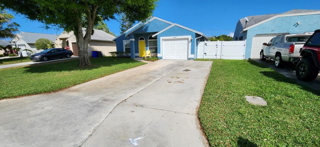 Photo of 5867 SE Mitzi Lane, Stuart, FL 34997 (MLS # R10965515)