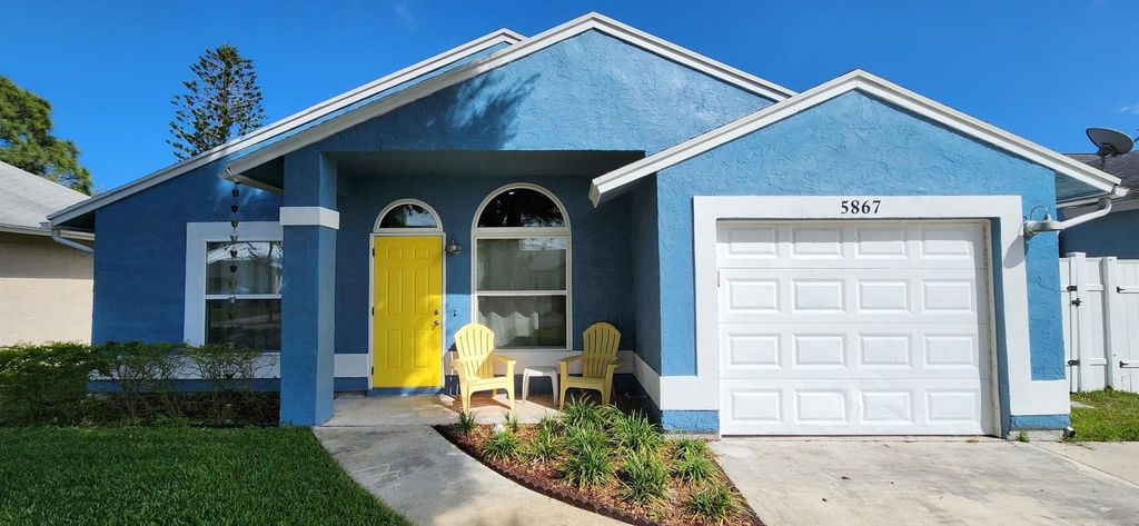 Photo of 5867 SE Mitzi Lane, Stuart, FL 34997 (MLS # R10965515)