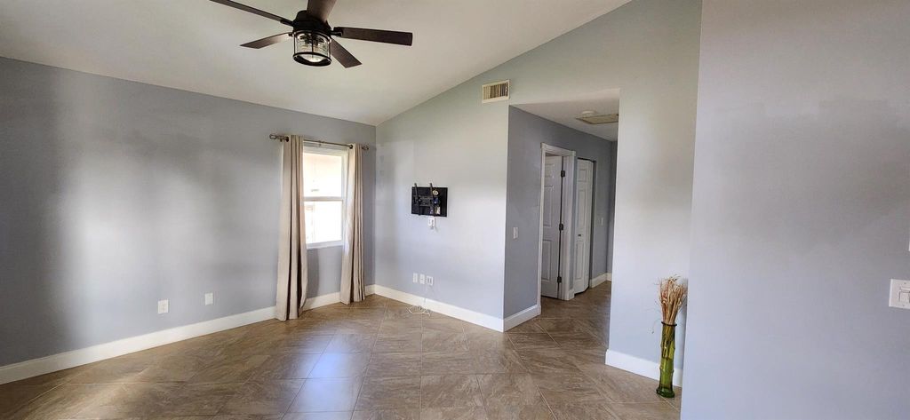 Photo of 5867 SE Mitzi Lane, Stuart, FL 34997 (MLS # R10965515)