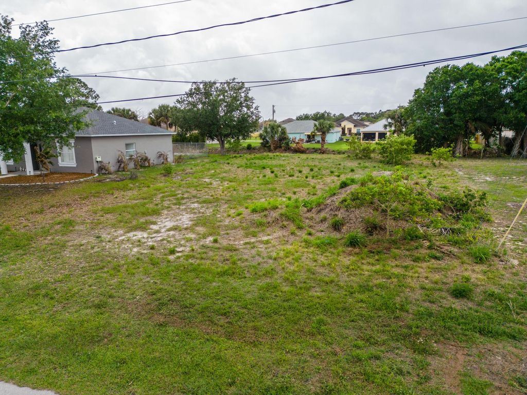 Photo of 1110 SW Hunnicut Avenue, Port Saint Lucie, FL 34953 (MLS # B26018649)