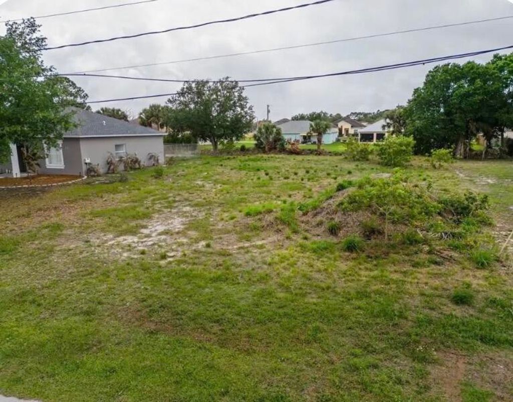 Photo of 1110 SW Hunnicut Avenue, Port Saint Lucie, FL 34953 (MLS # B26018649)