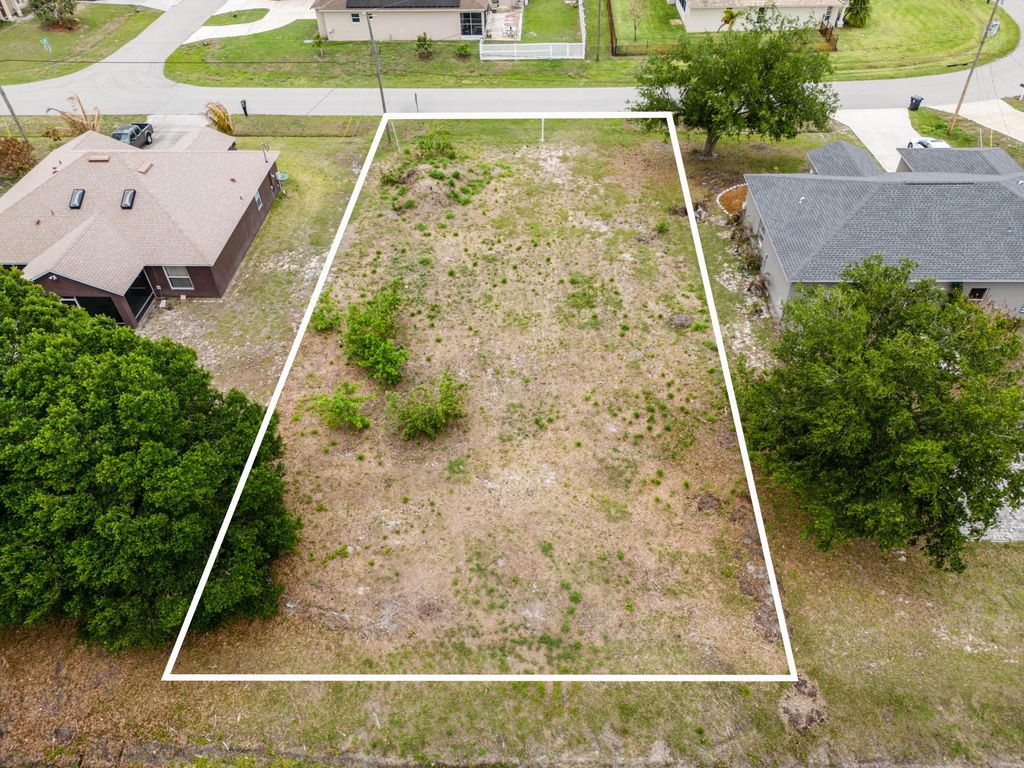 Photo of 1110 SW Hunnicut Avenue, Port Saint Lucie, FL 34953 (MLS # B26018649)